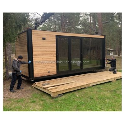 Gepersonaliseerde kleine houten metalen magazijn moderne uitbreidbare container geprefabriceerd huis voor buiten staal sandwichpaneel