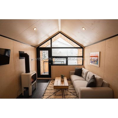 50/75/100mm Wave Sandwich Panel Muur voor winkelcentrum in driehoekige staalstructuur Ontwerp van EU Modern Flat Pack Container House
