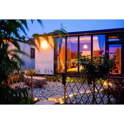 Eco-vriendelijke materialen 20ft 40ft 2 slaapkamers Prefab tuin hut huis glazen deuren container houten huis voor hotel