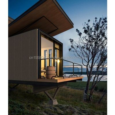 Gegalvaniseerde stalen vierkantbuizen geprefabriceerde modulaire hut Houten tuin zonneschermkamer Volledige uitrusting