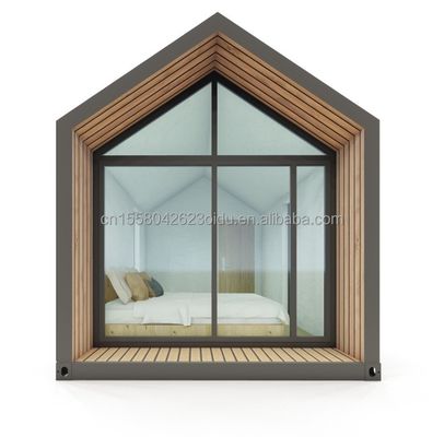 Modern Triangular Resort Hotel Prefab Container House met een slaapkamer Badkamer Keuken en tuin Kenmerken Sandwich Panel Door