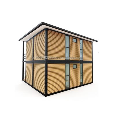 Aluminiumlegeringsvensters Gemodificeerde scheepvaartcontainer Voorafgebouwde houten vakantiehuizen voor familievakantie op het platteland