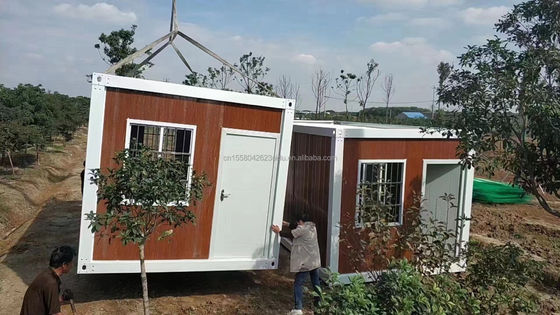 Gepersonaliseerde kleur 20ft geprefabriceerd plat pakket Bulk Container Frame House voor migrerende arbeiders op de bouwplaats